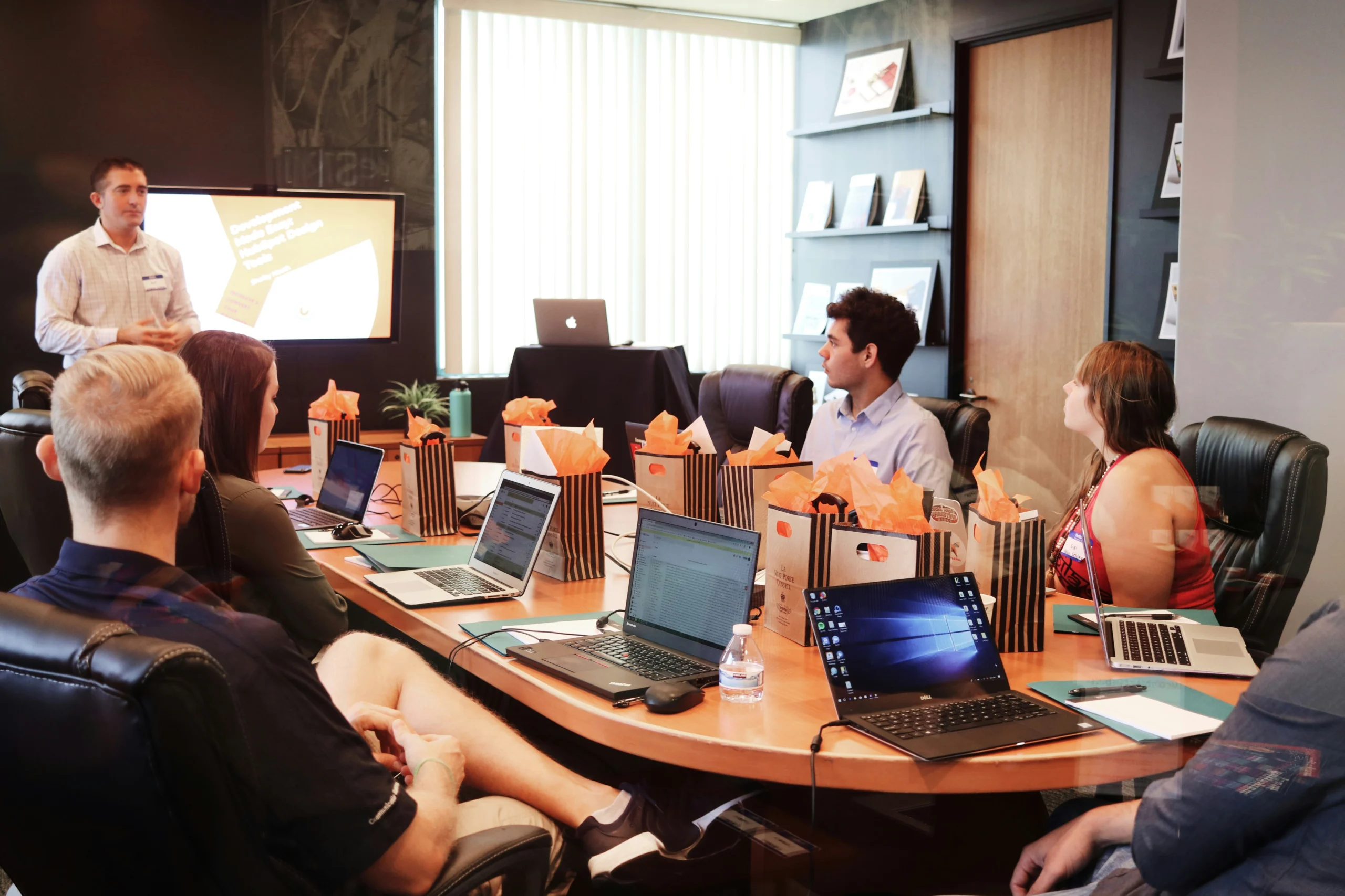 Business team reviewing HR metrics for small businesses for hiring and employee performance